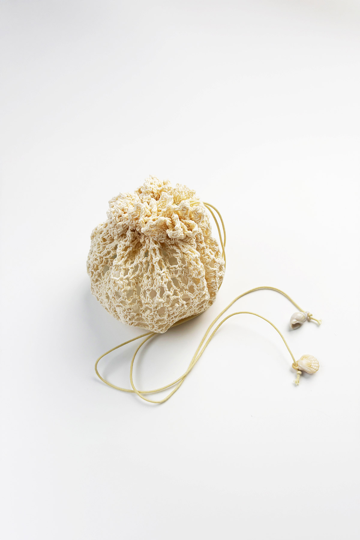 CROCHET DRAWSTRING POUCH - CREME [BY MODPARADE]